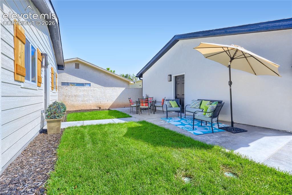 Image 43 of 49: Another view of the backyard area. Note the easy access to the brand new, 2