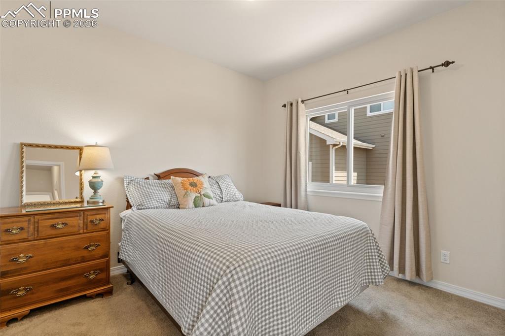 Image 18 of 31: Main level guest bedroom 1