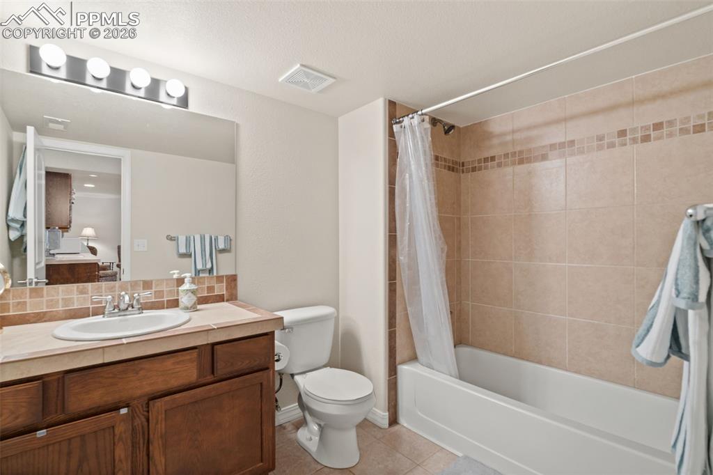 Image 27 of 31: Basement full bathroom