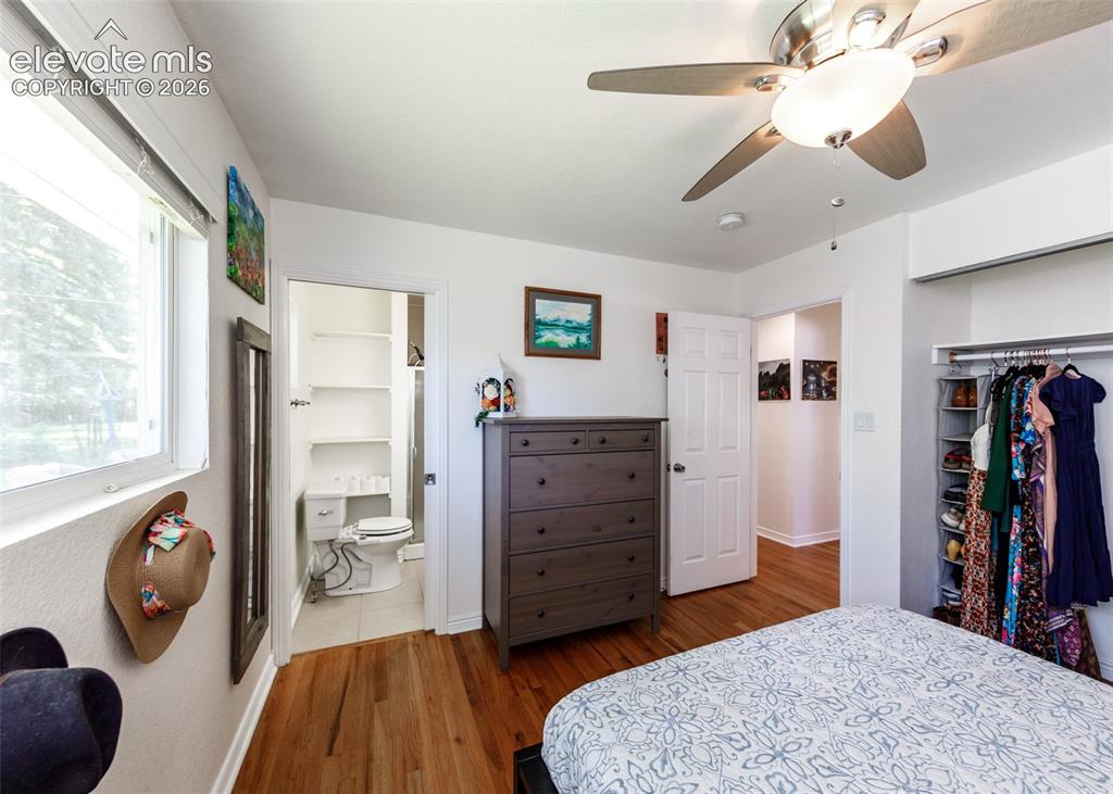 Image 19 of 47: Hardwood flooring, recessed lighting, and a ceiling fan with integrated lig