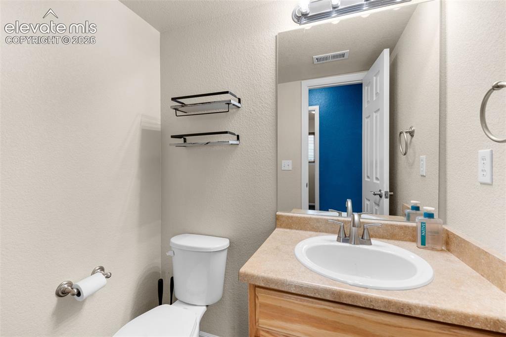Image 20 of 47: Half Bathroom
