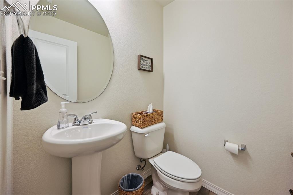 Image 20 of 45: Convenient Half Bath on Main