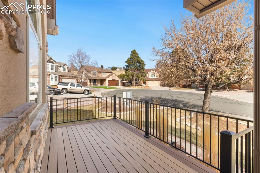 Image 10 of 49:  large front deck is a great gathering place. 