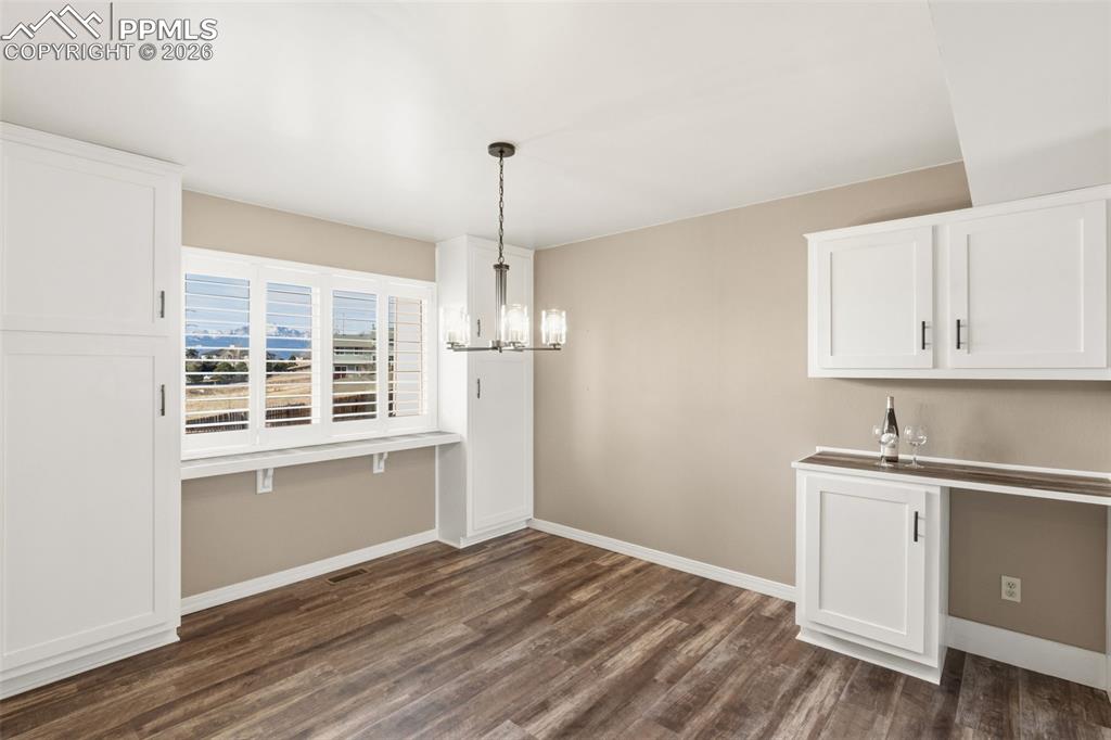 Image 18 of 49: a great spot for a wine cooler.