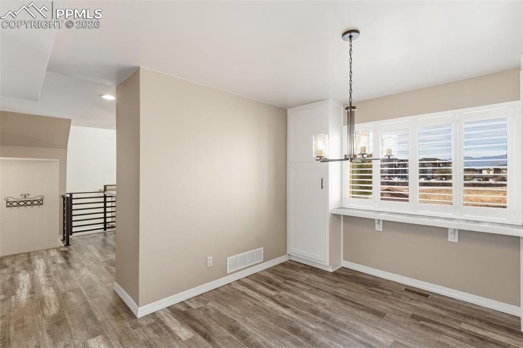 Image 19 of 49: additional storage in the dining room