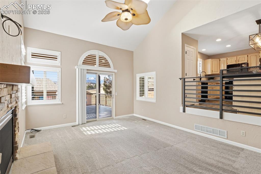 Image 21 of 49: walkout to the covered rear deck. 