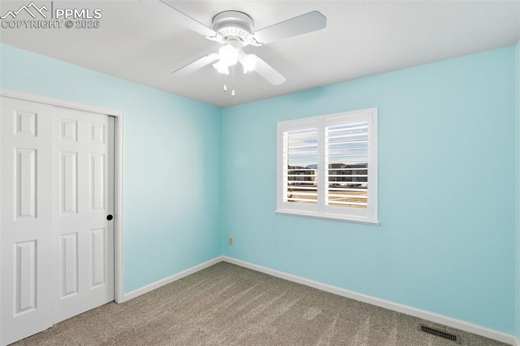 Image 34 of 49: The upper 3rd bedroom