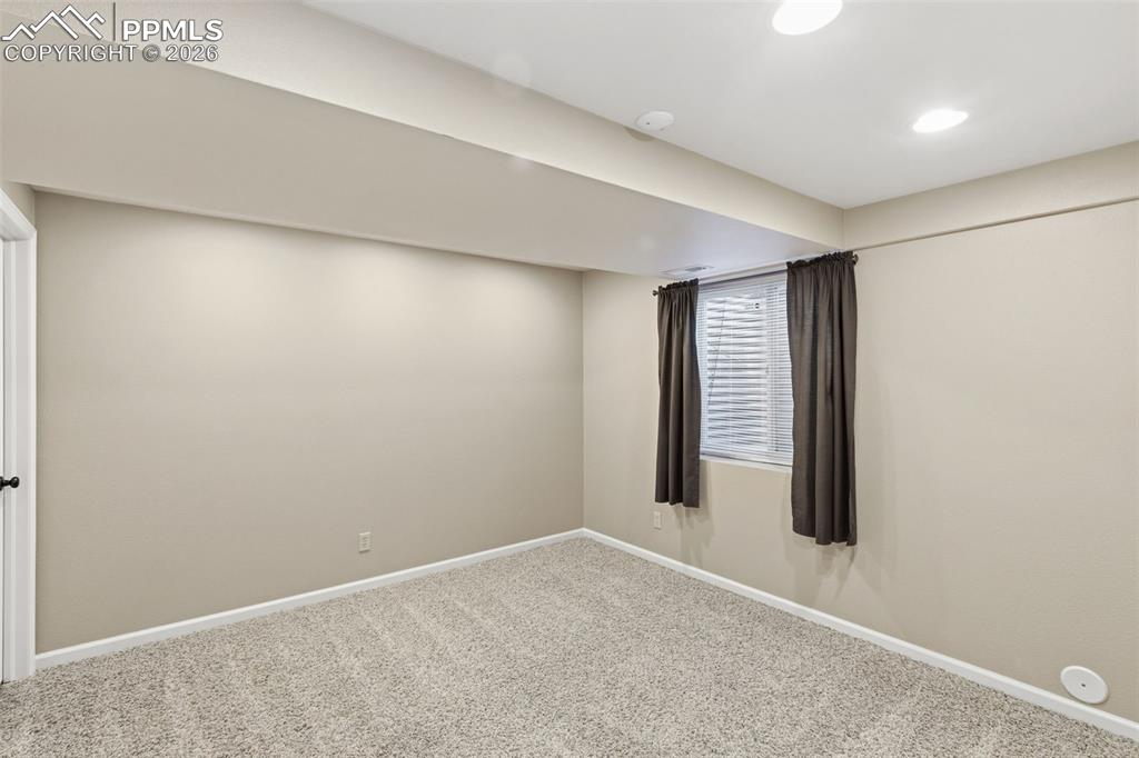 Image 38 of 49: The basement 4th bedroom has a Walkin closet.