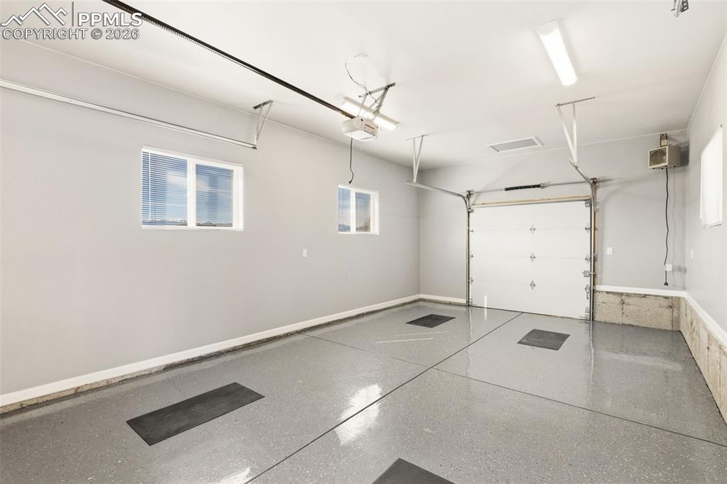 Image 39 of 49: Detached garage is also heated and can work great as a workshop or can stor