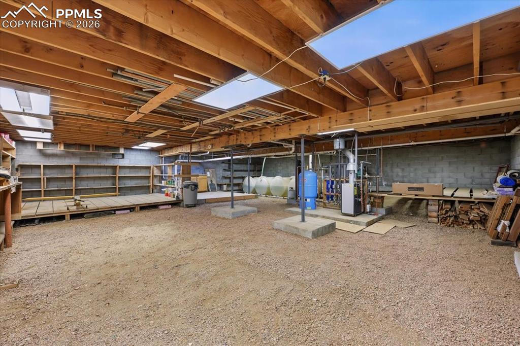 Image 39 of 49: Cabin crawl space