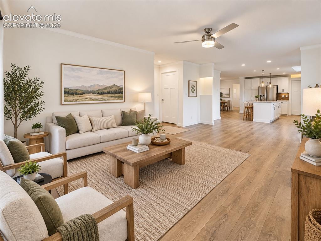 Image 2 of 47: Living Room & Kitchen – The spacious main living area opens directly to the
