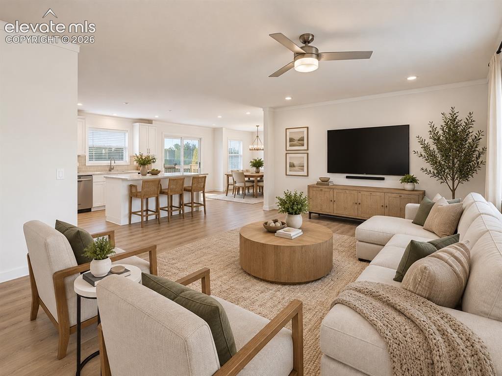 Image 20 of 47: Family Room & Kitchen – Open sightlines connect the living room with the ki