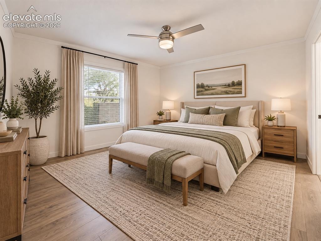 Image 22 of 47: Primary Bedroom – Another view of the primary bedroom highlights its genero