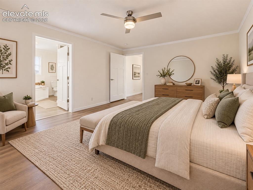 Image 24 of 47: Primary Bedroom – Alternate primary-bedroom view highlights the spacious la