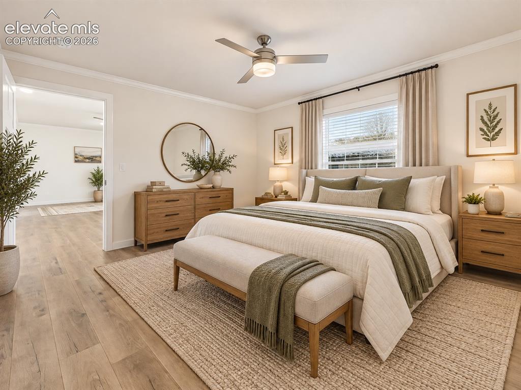 Image 25 of 47: Primary Bedroom – Generously sized primary bedroom offers wide-plank floori