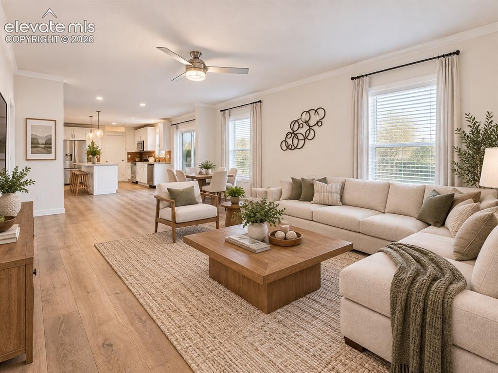 Image 3 of 47: Open-Concept Living Area – A wide view showcases the flow from the living r