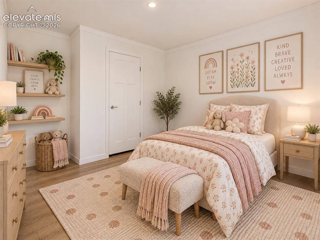 Image 32 of 47: Bedroom – Alternate bedroom view highlights the roomy layout, wide-plank fl