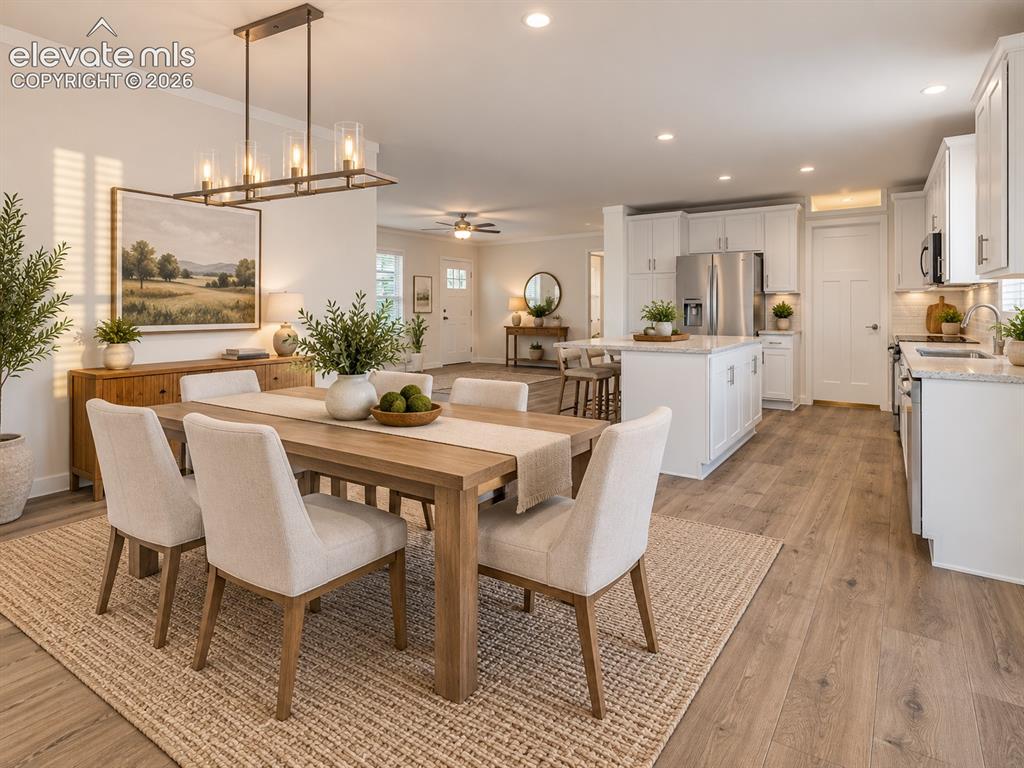 Image 7 of 47: Spacious dining area connects seamlessly with the kitchen and adjoining liv
