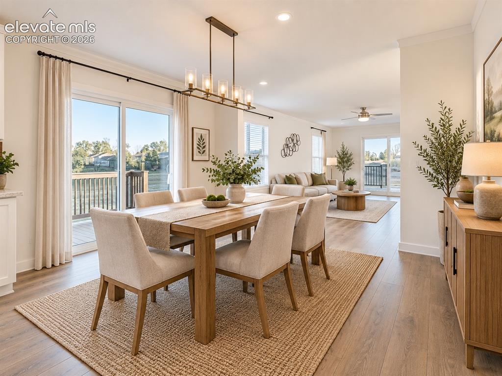 Image 8 of 47: Open-concept dining and living spaces create an easy flow for everyday livi