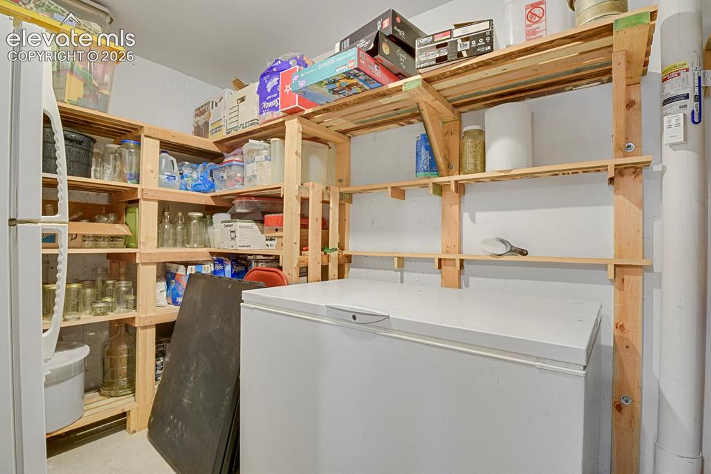 Image 31 of 46: Lower level storage room