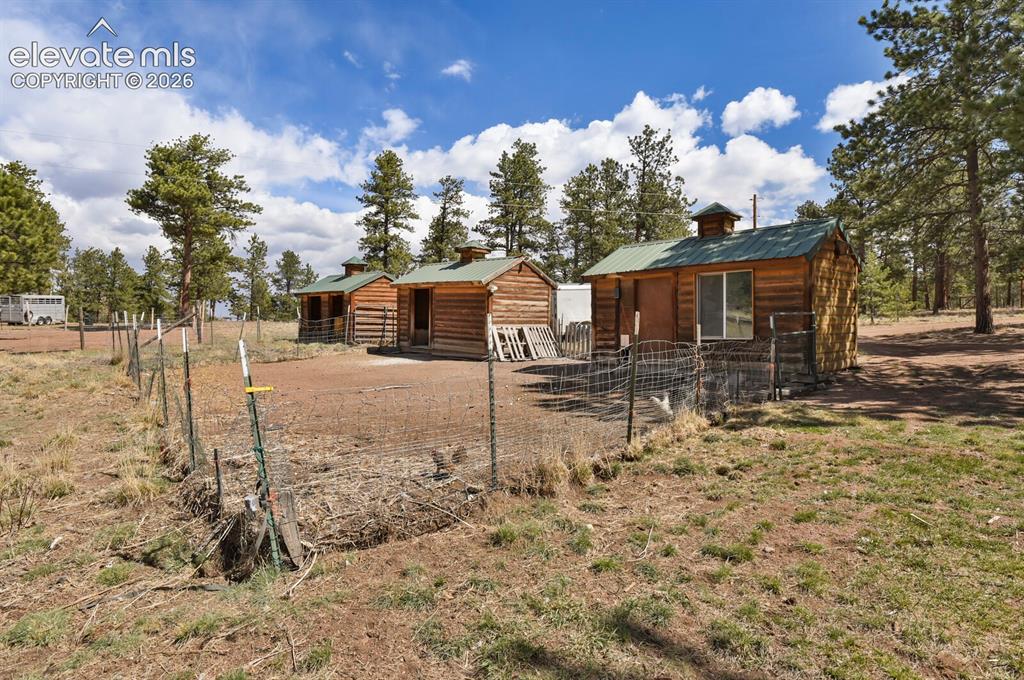 Image 36 of 46: Chicken coop and outbuildings