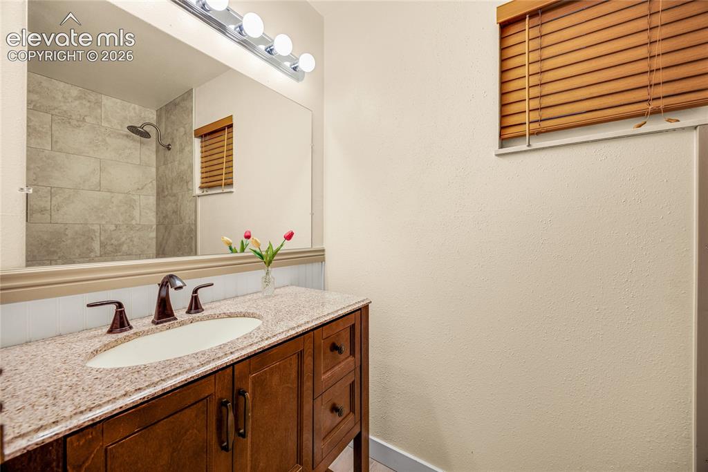 Image 16 of 24: Main level bathroom