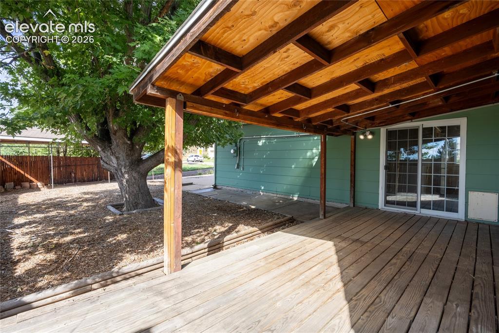 Image 19 of 24: Large covered deck