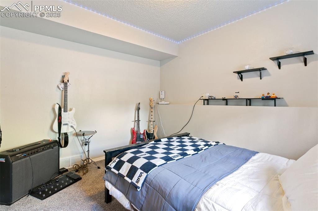 Image 33 of 39: Bedroom