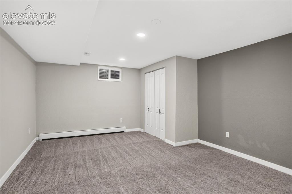Image 20 of 30: Basement Bedroom 1