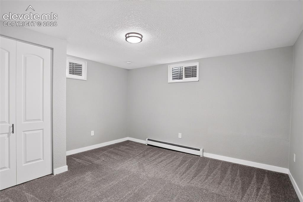 Image 21 of 30: Basement Bedroom 2