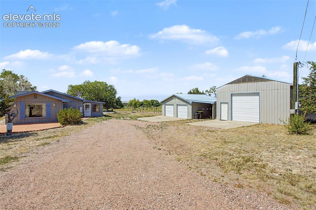 Image 13 of 50: Over 5 acres with charming rancher and fantastic outbuildings!