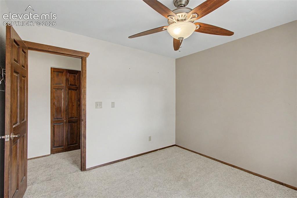 Image 29 of 50: One of three bedrooms.