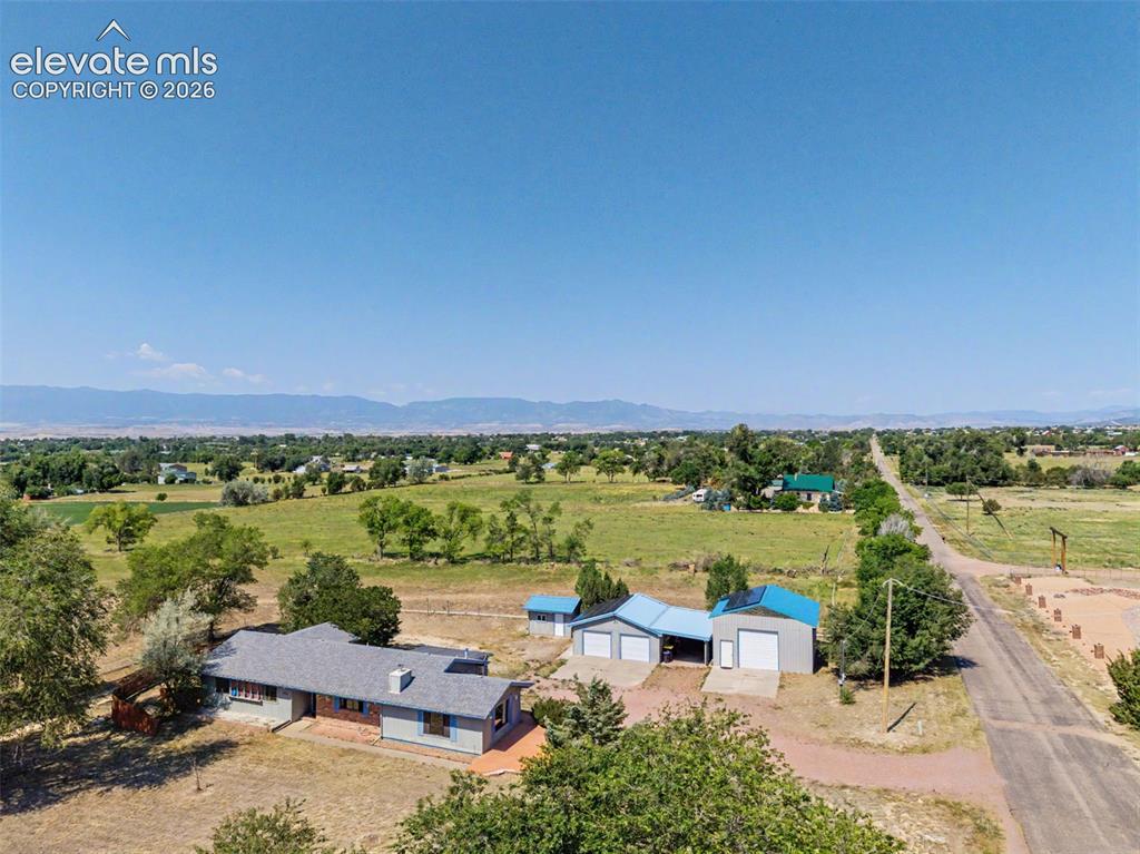 Image 8 of 50: Over 5 acres with charming rancher and fantastic outbuildings!