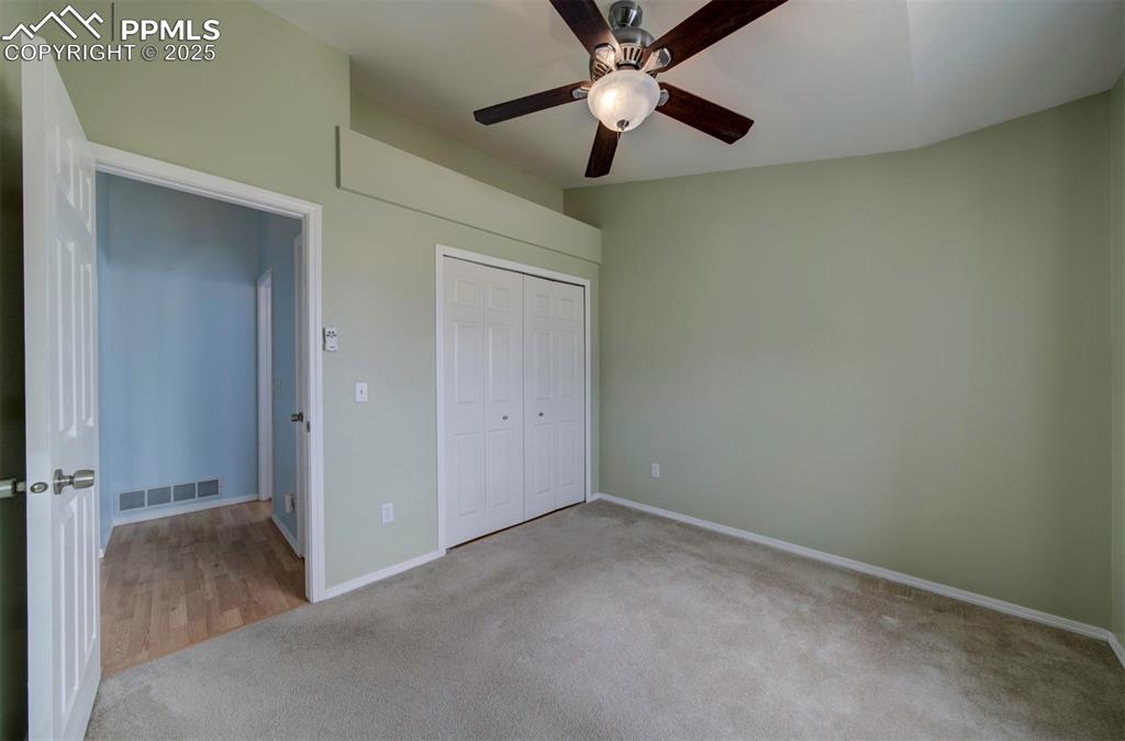 Image 21 of 30: 2nd bedroom, carpet, ceiling fan