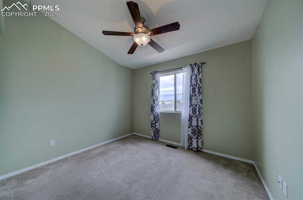 Image 22 of 30: 2nd bedroom, carpet, ceiling fan