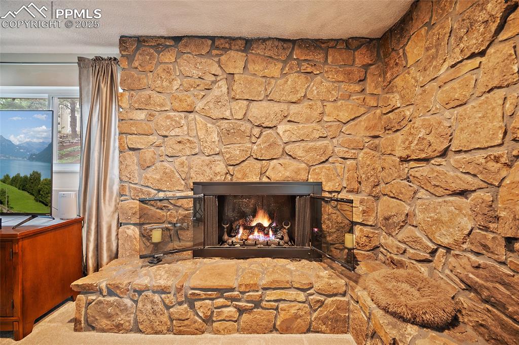 Image 15 of 47: Fireplace