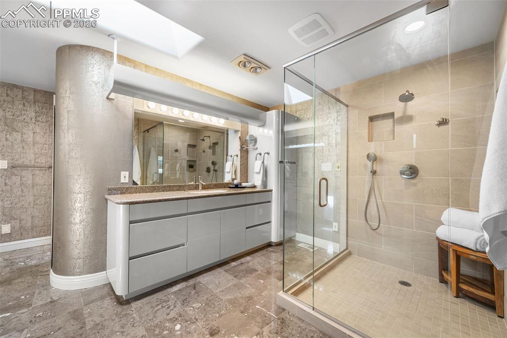 Image 16 of 50: Master Bathroom