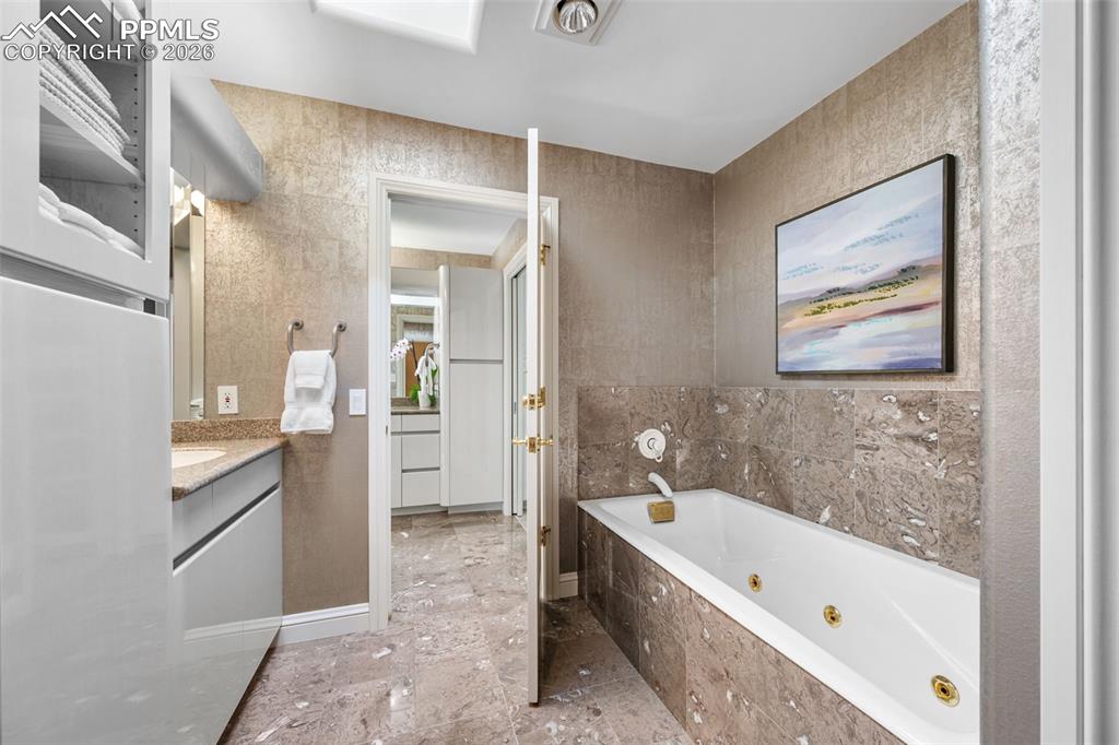 Image 18 of 50: Master Bathroom