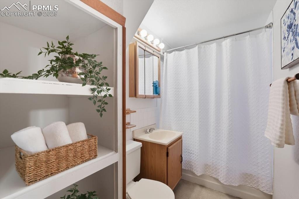 Image 15 of 30: Full bath featuring shower / bath combo and vanity