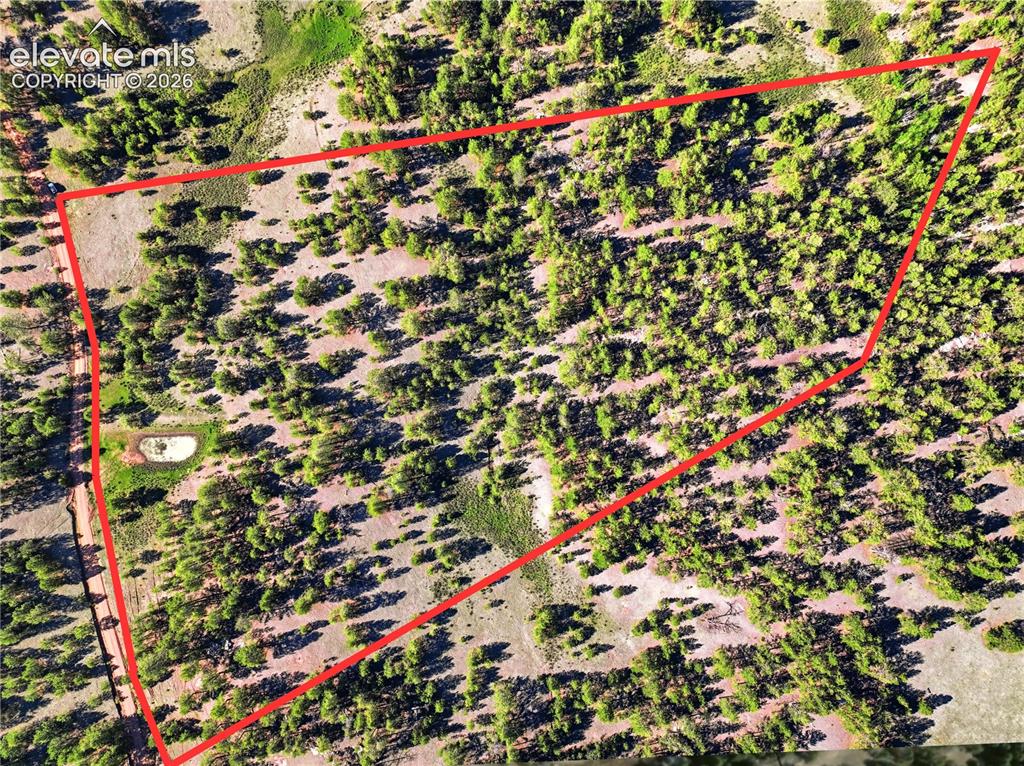 Image 11 of 19: Aerial Survey. Outlining the property boundaries via an overhead perspectiv