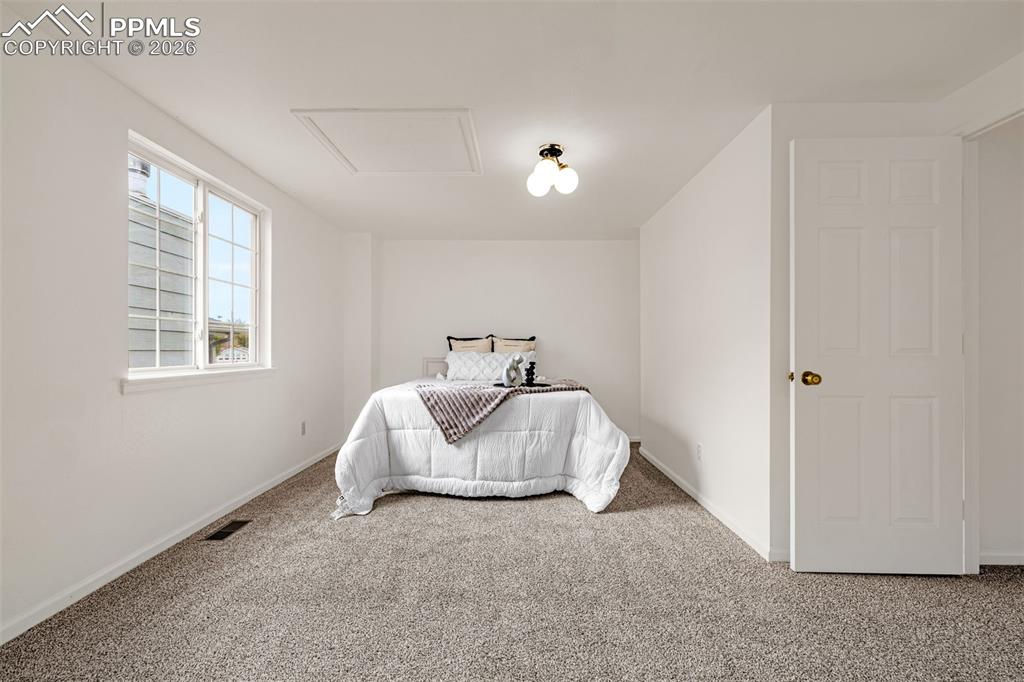 Image 23 of 38: Bedroom