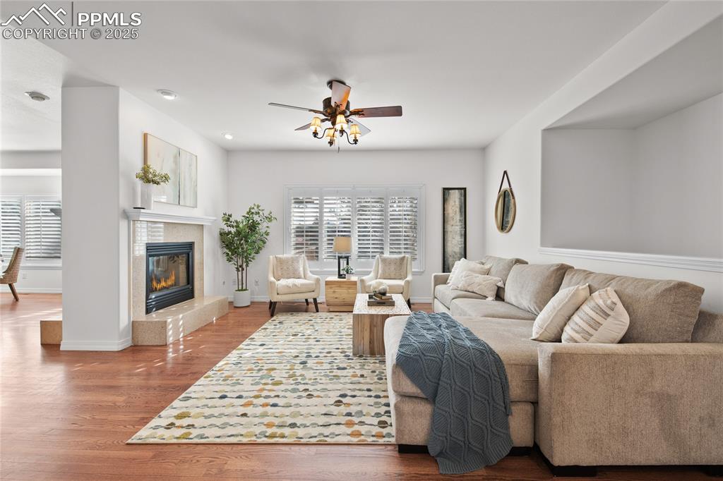 Image 16 of 50: Spacious living on the main level. 9ft ceilings throughout the main level. 