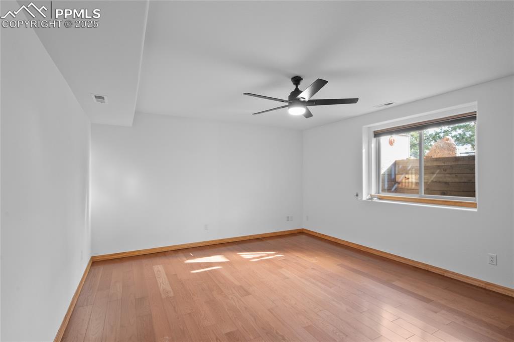 Image 44 of 50: Basement Bedroom