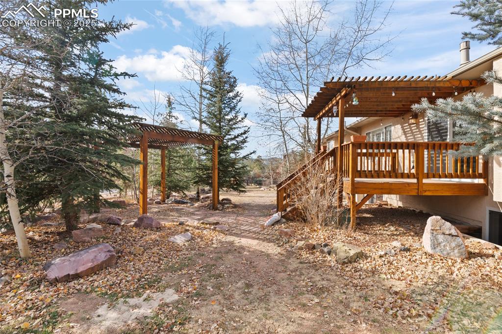 Image 47 of 50: Plenty of yard space for playing, relaxing or entertaining. Fully fenced in