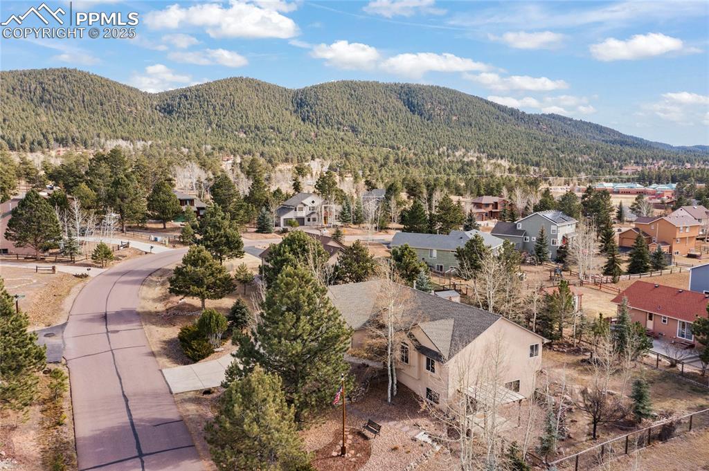 Image 8 of 50: Check out the mountains to the north of the home! That’s national forest an