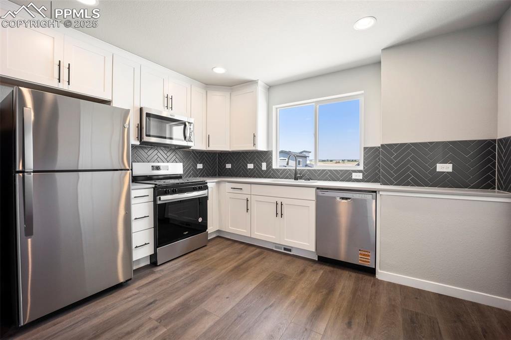 Image 33 of 47: Upper level multi-gen suite kitchen