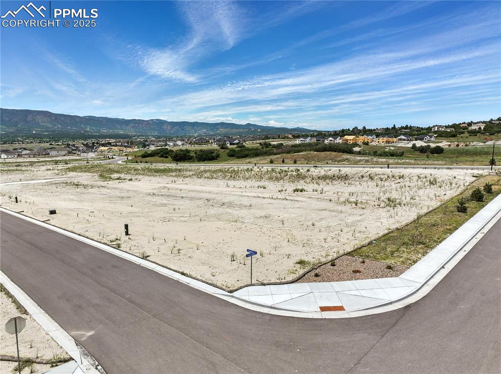 Image 4 of 6: View of mountain background with rural landscape