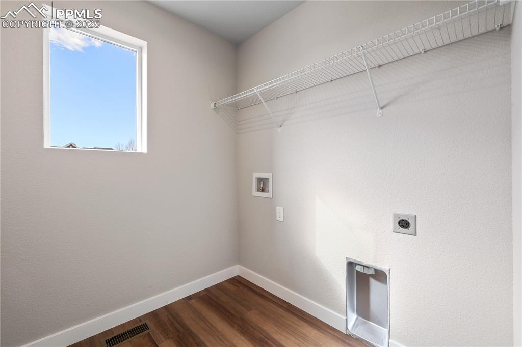 Image 19 of 25: Laundry area featuring washer hookup, and hookup for an electric dryer