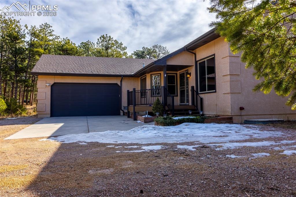 Image 1 of 50: With easy maintenance decking to front door