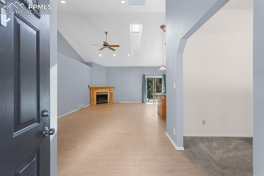 Image 12 of 50: Entry looking through to living room